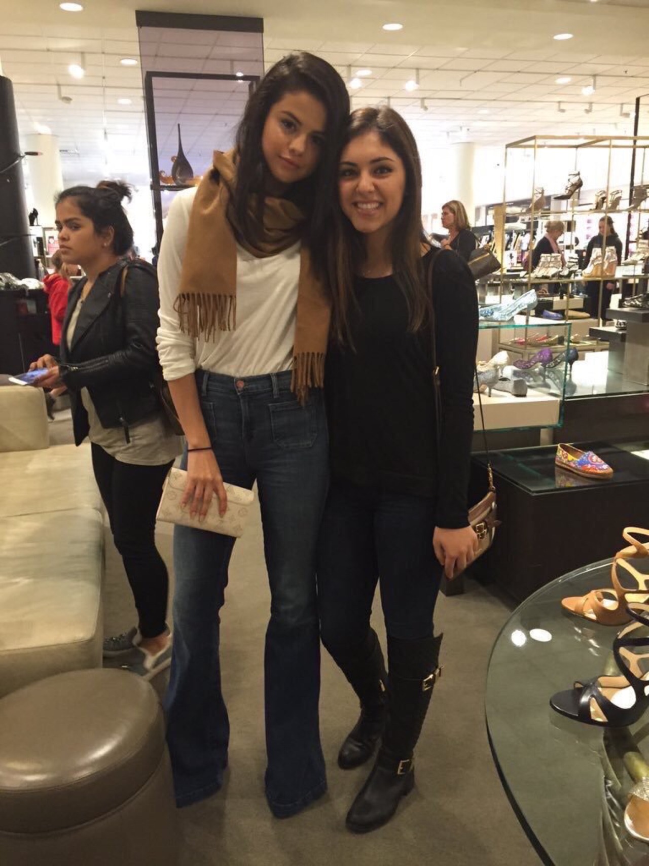 January 8: Selena with a fan at NorthPark Center in Dallas, TX