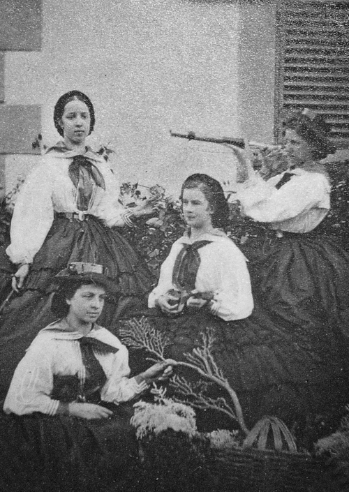 teatimeatwinterpalace:

✧ Empress Elisabeth of Austria and her family Spam [37/50] ✧
Photograph of Elisabeth taken in Madeira. The Empress is sitting playing mandolin with ladies.