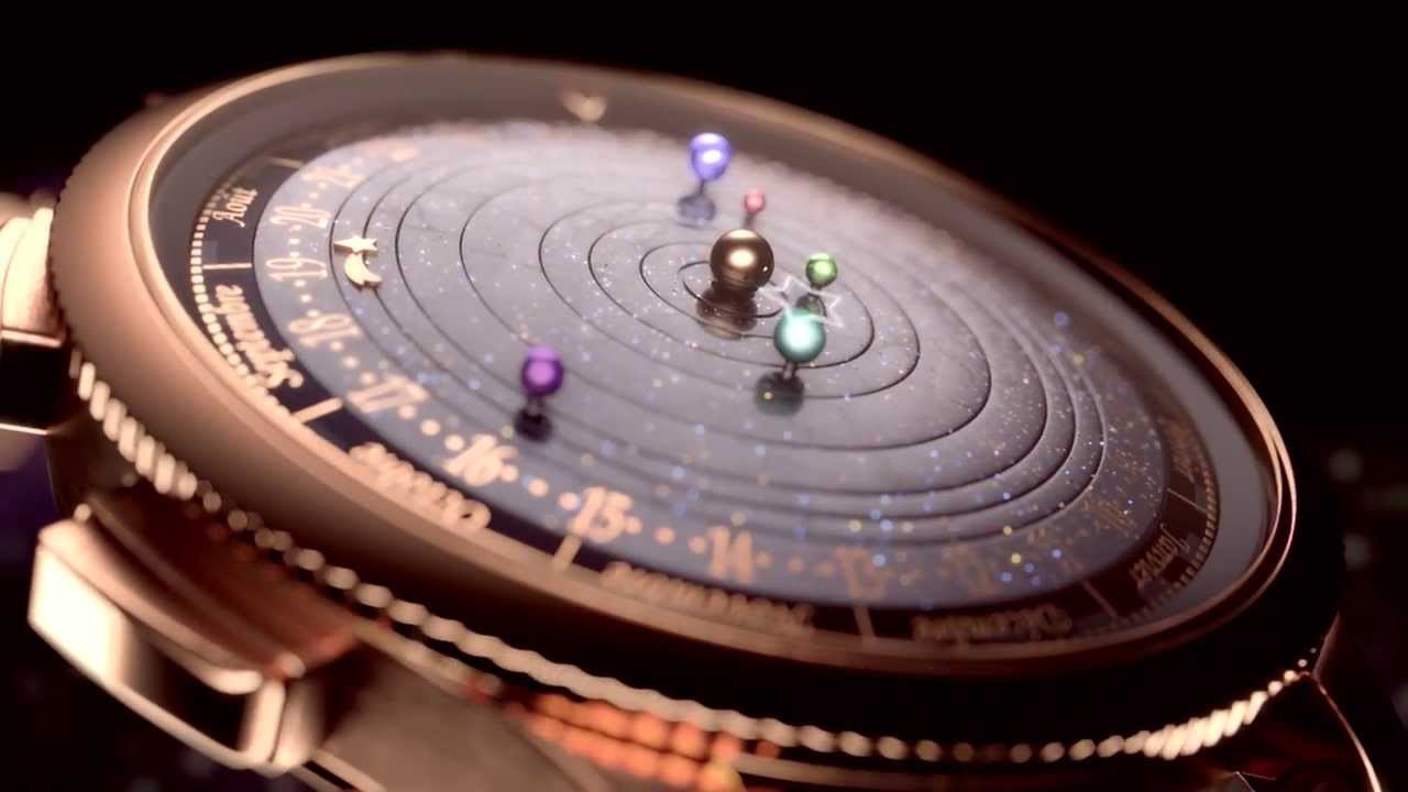 uhohmarty:

A gorgeous watch that has the planets visible from earth rotating in real-time.
