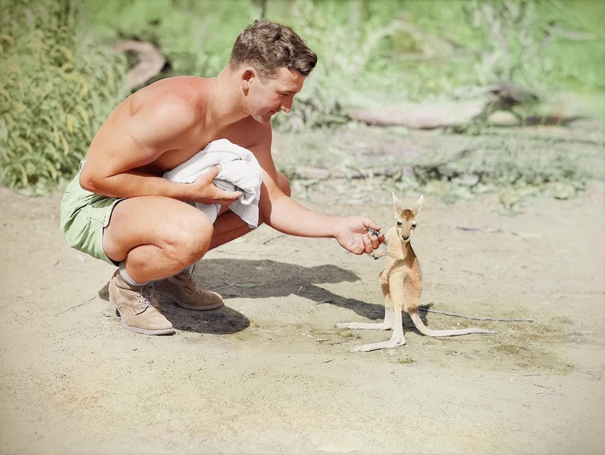 harryandee:

Colourised black and white photo of an American soldier at an allied base in 1942 
This is amazing
