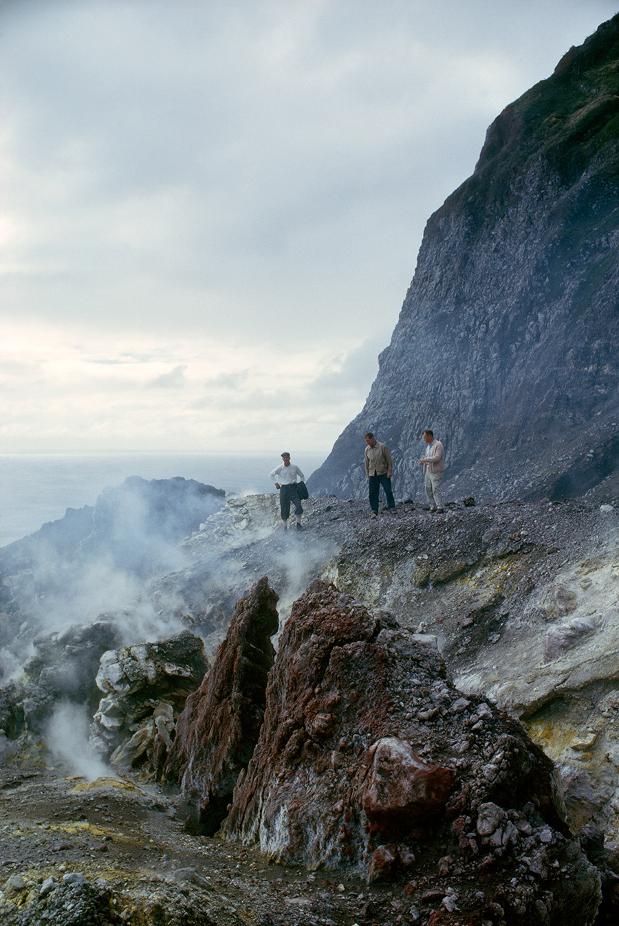 Men stand beside a volcano&rsquo;s crater eighteen months after an eruption on Tristan da Cunha Island, 1964.Photograph by James P. Blair, National Geographic Creative