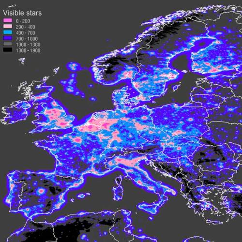 Map of the number of visible stars in Europe nelg:Source http://www.inquinamentoluminoso.it/dmsp/numstar.html  

There are other maps, covering the whole world, of artificial night sky brightness. http://www.inquinamentoluminoso.it/dmsp/artbri.html  

I chose this over the wider maps, because I felt it to be more descriptive and down-to-point about what light pollution actually entails. From an astronomic or everyday point of view, you see less stars. From an economic point of view, it is simply watt-hours straight into space (from which a certain percentage is reflected and again lights up the ground, granted).

Wikipedia entry on light pollution.

