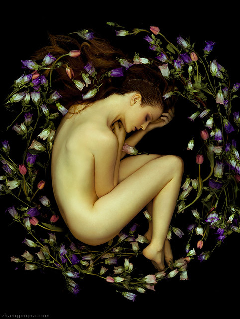 Motherland Chronicles #47 - Womb I kept thinking about the legends of Nu Wa when working on this piece. It was one of the first stories of creation I read as a child, the flowers reminded me of the five-colored stones she used to mend the heavens. Photography: Zhang Jingna zemotion Hair: Junya Nakashima Makeup: Gregg Brockington Model: Germaine Persinger Photo Assistants: Ngoc Vu, Bitna Kim, Tiffany Liu<br />
Follow me! ~ Instagram ~ Tumblr ~ Facebook  Zhang Jingna