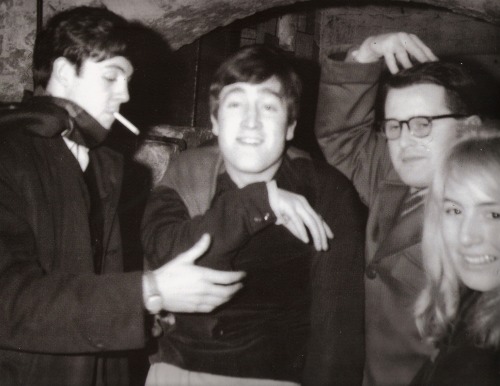 Scan - Paul McCartney, John Lennon, Ray McFall and Cynthia at the Cavern Club, 1962
Photo: Mike McCartney
"The Cavern dressing room; John and Paul are gooning with Ray McFall, the club&#8217;s manager, and Cynthia."