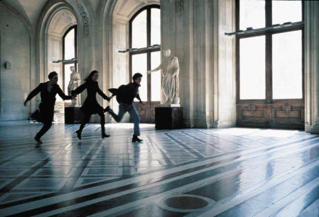 acehotel:

Running through The Louvre, from Bernardo Bertolucci's The Dreamers. 
Today the filmmaker turns 74. And to this day The Louvre forbids running.

