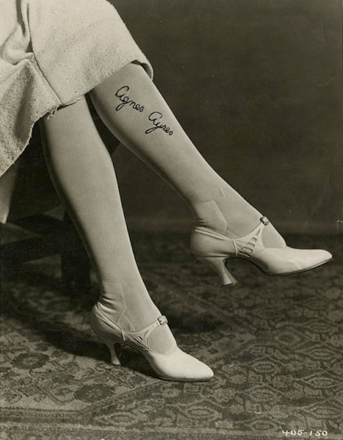 gmgallery:

Paramount publicity photograph of Agnes Ayres in her signature stockings, 1920s.CLOCKS, LACE AND OTHER STOCKING DESIGNS HAVING BECOME A BIT USUAL – NOW ARRIVES THE AUTOGRAPHED STOCKING. WITH CAREFUL EMBROIDERY MILADY DUPLICATES HER SIGNATURE EQUIDISTANT BETWEEN KNEE AND ANKLE. AGNES AYRES, PARAMOUNT STAR, IS ONE OF THE FIRST TO ADOPT THE NEW FAD.https://www.etsy.com/shop/GrapefruitMoonFinds