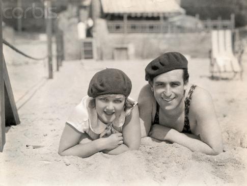 Mildred Davis and Harold Lloyd relaxing at the beach
Circa:  1920s