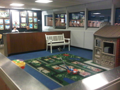Kids play area at Salt Lake City Airport two days before Christmas, Vacant, with two non-parents sipping coffee. Does this suggest that early morning flights are preferred to avoid kids needing to burn off energy? (Salt Lake City, Utah) 20101223&#160;0730t