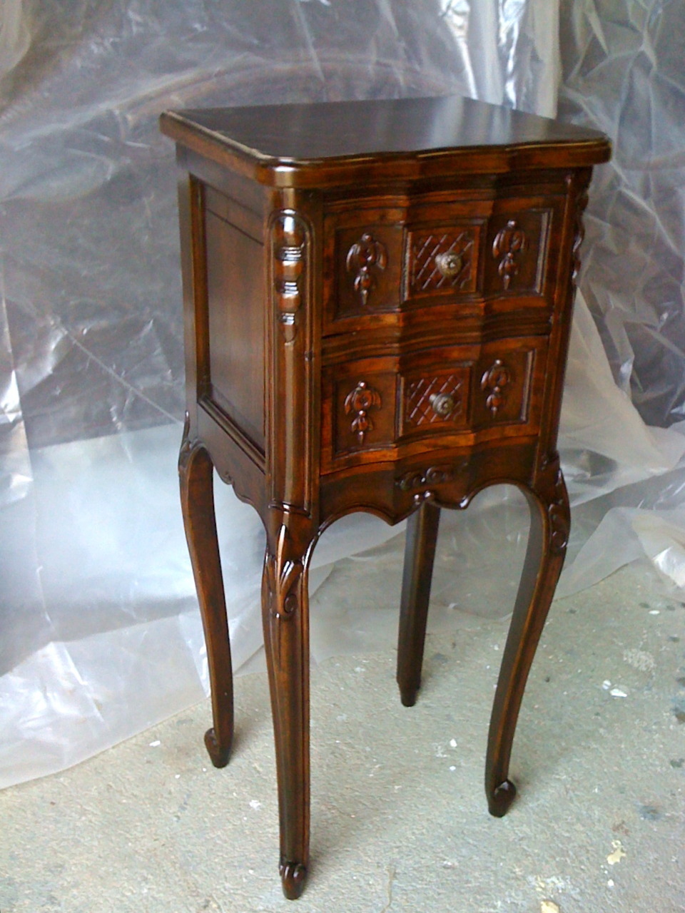 This antique side table was purchased by its owner during a trip to NY 