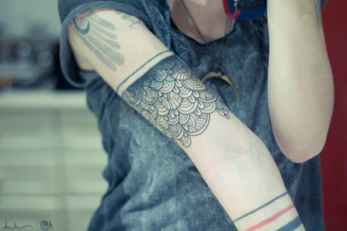 Arm band tattoo.