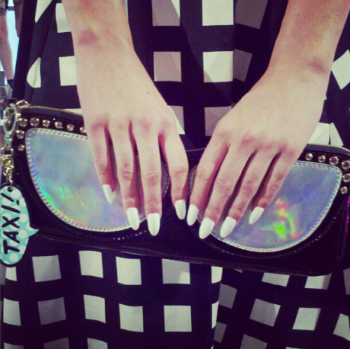 pointy white nails at kate spade today