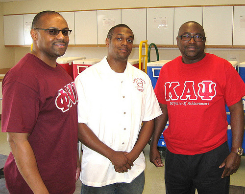 Brothers Charles Bruce, Travis McKinney, and Derrick Washington volunteering for Meals on Wheels (Ann Arbor-Ypsilanti) on August 25, 2013