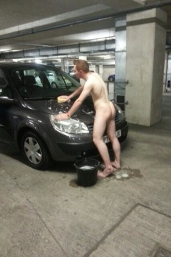 riskyinpublic:  forbiddensights:  Hotty scrubbing his motor!  Naked car wash in a public car park - was this a dare?! Hot! 