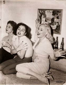 Valerie Reynolds, Jeanne Carmen and Mamie Van Doren at the “Untamed Youth” post-premier party, 1957.