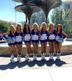 cheerleaderspantyhose:  Beautiful Texas Christian University cheerleaders posing in purple and white tank tops, purple Daisy Dukes, white cowgirl boots, and suntan pantyhose. 