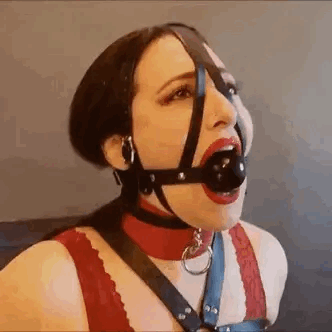 ilikeballgaggedgirls:This is why a ball gag harness is a better option than a regular ball gag. The harness prevents the ball from getting pushed out. Isn’t that great? 😊 