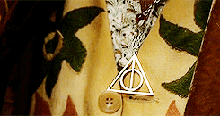  There is nothing Dark about the Hallows — at least, not in that crude sense. One simply uses the symbol to reveal oneself to other believers, in the hope that they might help with the Quest. 