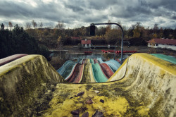 destroyed-and-abandoned:  A beautiful depiction of childhood times forgotten. Abandoned Waterpark unknown location