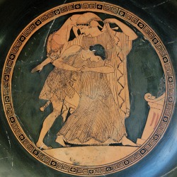 lionofchaeronea:  Peleus seizes Thetis, who transforms into a lion in an attempt to escape his grasp.  Tondo of an Attic red-figure kylix, attributed to the painter Douris; ca. 490 BCE.  Found at Vulci; now in the Cabinet des Médailles, Paris.