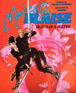 Modesty Blaise: Death Of A Jester, written by Peter O’Donnell, illustrated by Romero (Titan Books, 1987). Cover art by John M. Burns.From Oxfam in Nottingham.