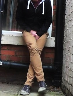 cutewetmess:  A few photos of me pissing myself outside. Male desperation, wetting and pants pooping:http://cutewetmess.com 