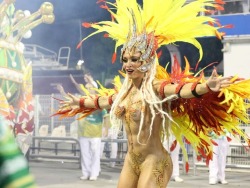 Naked woman in body paint at Brazilian carnival,