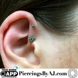 piercingsbyaj:  Fresh 18g double forward helix featuring a 14k yellow gold daisy with mint green and amethyst CZs from Neometal!