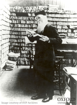 myimaginarybrooklyn:  oupacademic: Happy Birthday to our beloved James Murray, the first editor of the Oxford English Dictionary. Here he is in his Scriptorium in Oxford, wearing his John Knox cap and holding a book and a Dictionary quotation slip. We