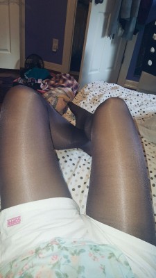 tightsbabe:  lounging in my new plum Fiore tights!! love them. ♡♡♡
