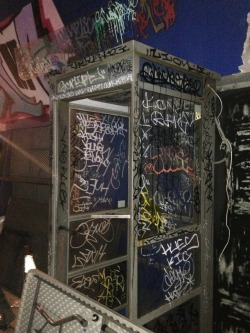jaimeregulates:  Last night at this art show I went to this old school phone booth had NO taggs on it, within an hour this is how it ended up looking…. 