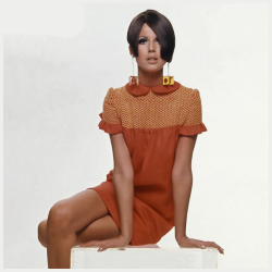 Model wearing a dress by Lynn Stuart and futuristic plastic earrings photographed by Bert Stern, 1966.