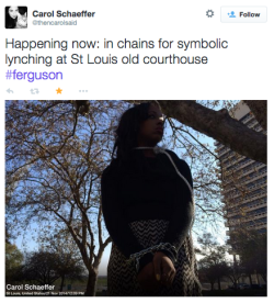 christhepusher:  socialjusticekoolaid:  Today in Solidarity (11/21/14): Ferguson protesters stage a mock lynching outside of the same courthouse Dred Scott was proclaimed less of a human being for his blackness. More than a century later, we’re still