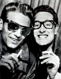 old-school-fools:Waylon Jennings and Buddy Holly in a photobooth, 1959  Not to be confused with the Wallin Jennys. :-)