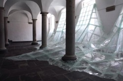  Aerial | Baptise Debombourg. Shattering glass flooding into a room of Brauweiler Abbey in Germany. 