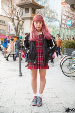 tokyo-fashion:22-year-old Misa on the street in Harajuku wearing a black jacket over a plaid dress, a Supreme backpack, a tattoo necklace, and Adidas sneakers. Full Look