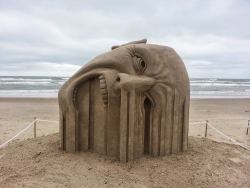 sixpenceee:  Incredible “Bleeding” Sand Sculpture by Guy-Olivier Deveau