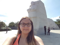 Me at the MLK Jr Memorial here in Washington D.C.It was such a beautiful monument and the wall behind it with his quotes moved me to tears. It was the perfect day for walking amongst the memorials.