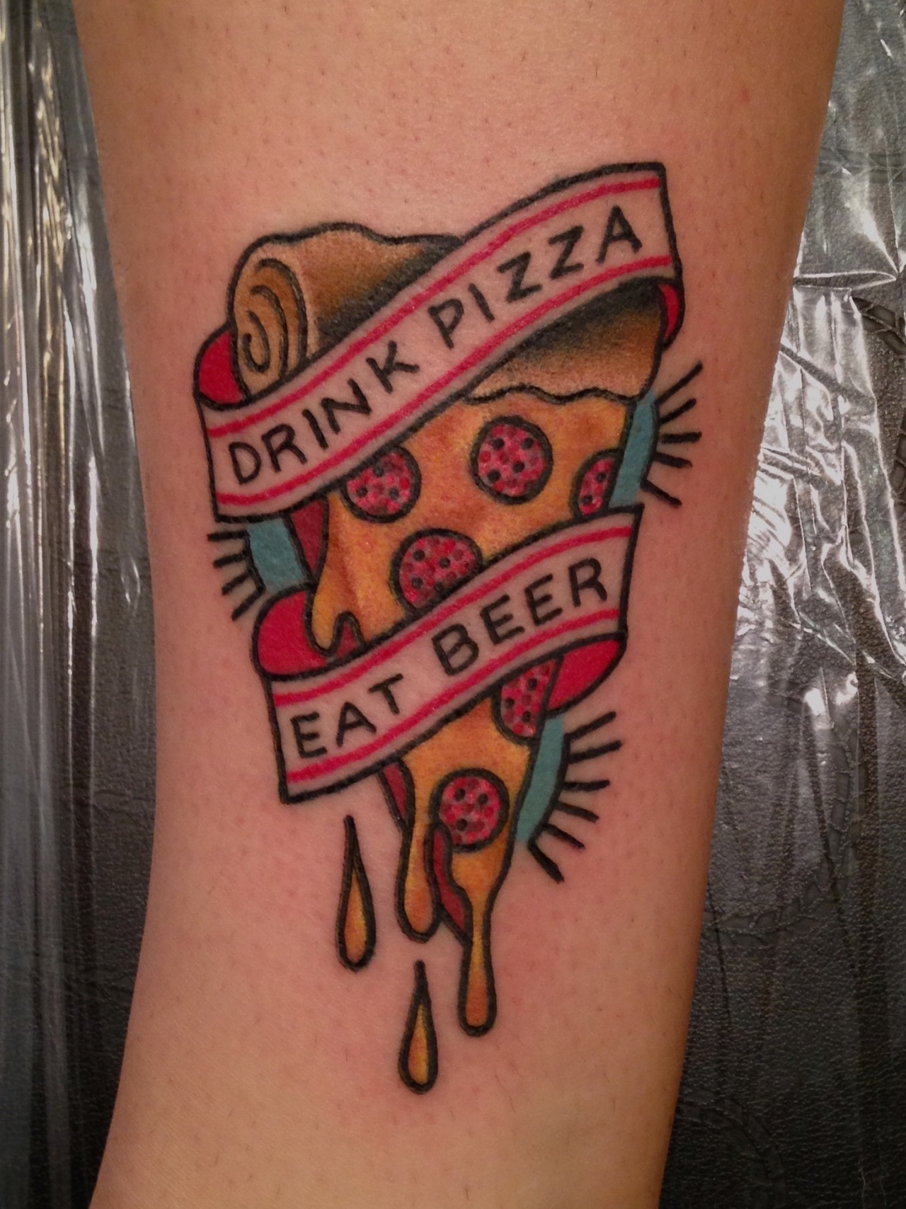 Pizza guy puts a tattoo