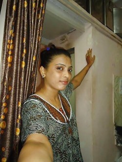 india-exotica:  amateur indian strips. Shows her trimmed pussy.http://india-exotica.tumblr.com