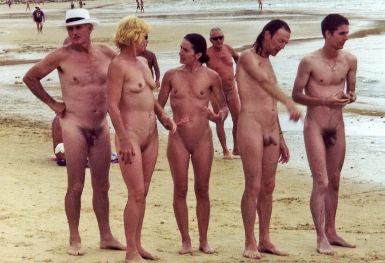 Nudist family on nude beach