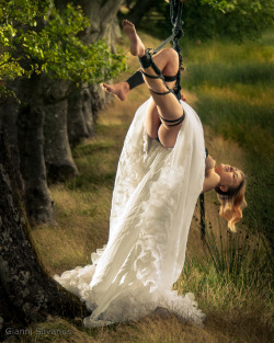 Bride suspended to a tree / Związana w lesie panna młoda