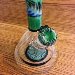 weedporndaily:  The newest addition to the personal collection - a custom, worked Zob mini beaker with showerhead perc and colorful reversals. #kjcustom #nfs by @brotherswithglass