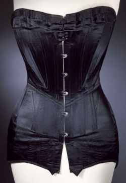 historicalcorsets:  Corset of boned black satin with metal fastenings, ca. 1900. Waist: 62 cm Bust: 106 cm Hips: 98 cm 
