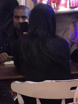 roomonfiyah:  stunningpicture:  My mom was seated next to Kim and Kanye at a restaurant in New York City tonight. She tried to sneak a picture but Kanye stared into her soul  Lmao 