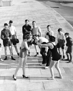 Reg Speller - Two female members of a keep fit group learn boxing techniques as part of self defence lessons,  1935.