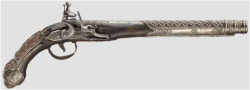 peashooter85:  A silver mounted Turkish flintlock pistol studded with red coral, early 19th century. 