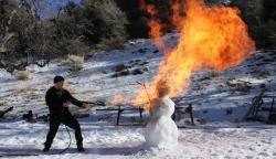 celesteluvsfood:  angryification:  Scott Ian of Anthrax burning a snowman with a flamethrower. So fucking metal.  How frosty actually melted 