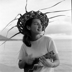 uketeecee:Girl with straw hat plays a Martin ukulele. Circa 1950’s.