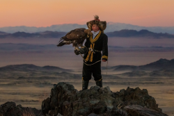 awkwardsituationist:  thirteen year old ashol pan is part of a nascent movement of girls who are keeping alive the six thousand year old kazakh tradition of golden eagle hunting known as berkutchy.     though long the monopoly of boys — once deemed