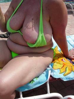 bbwcum:  Her tits, belly, and thighs - so big, fat, plump, and sexy. Her bikini really accentuates her delicious curves and rolls. &lt;3 